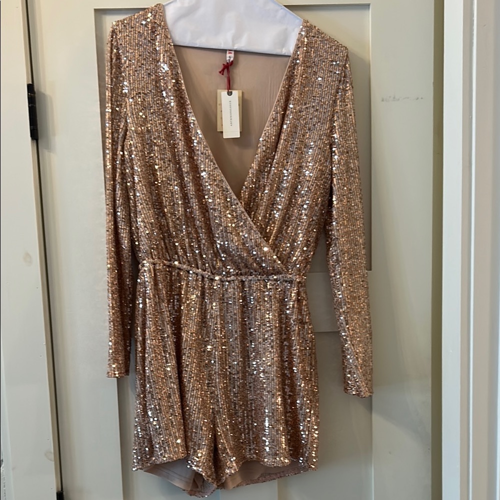 Sparkling Sequin Long Sleeve Romper from Anthropologie